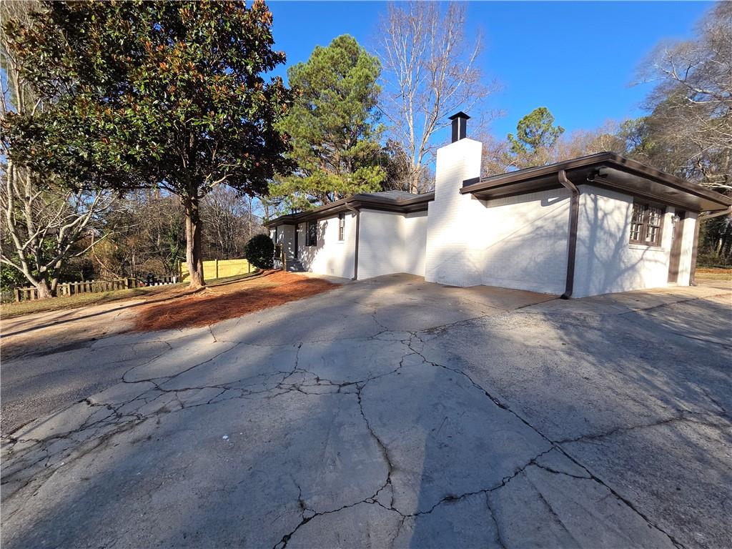 1576 South Gordon Road Southwest Austell, GA 30168 - Photo 10 of 33 a view of a house with a yard