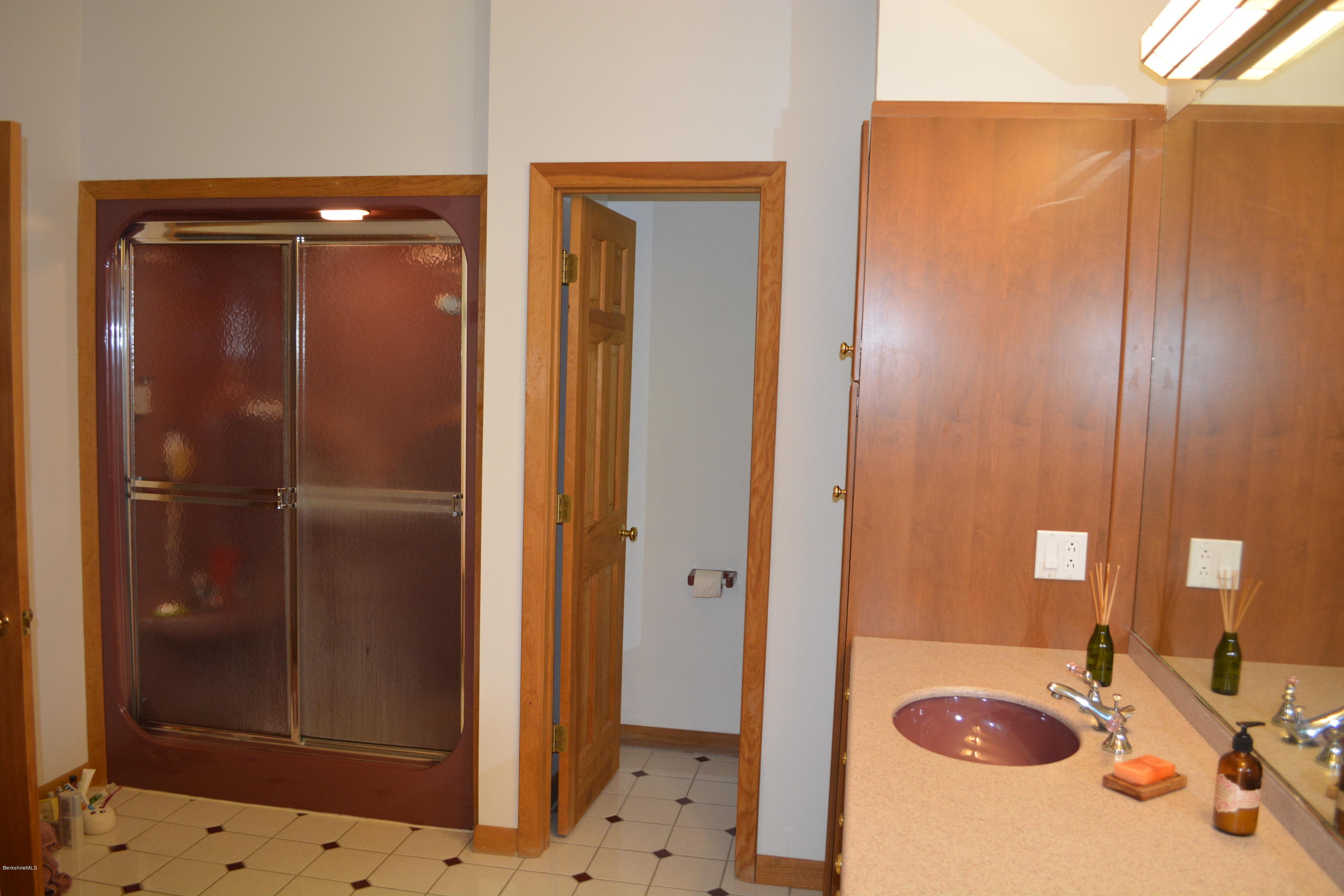 537 Norton Road Otis, MA 01029 - Photo 19 of 25 a bathroom with a sink and a mirror