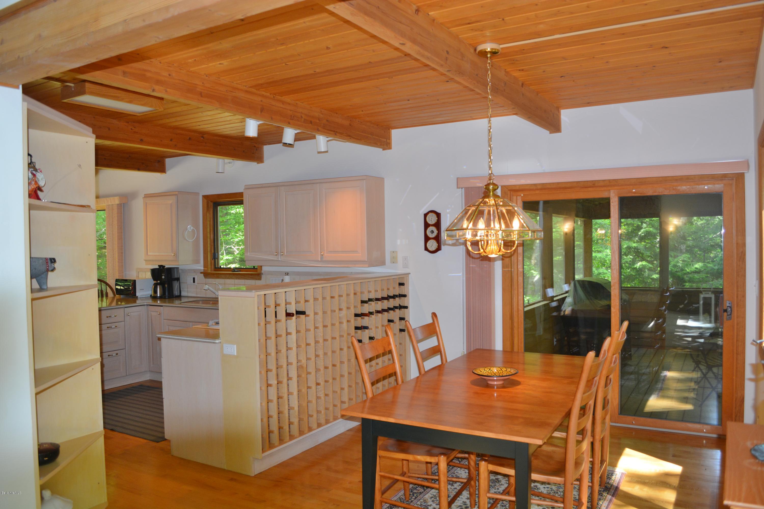 537 Norton Road Otis, MA 01029 - Photo 7 of 25 a dining room with furniture and window