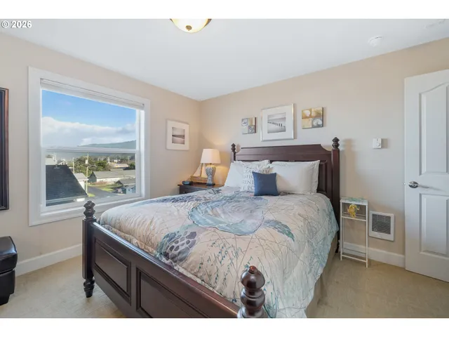 a bedroom with a bed and a walk in closet