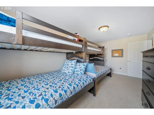 a bedroom with a bed and a walk in closet