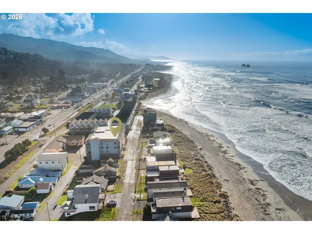 a view of a town with mountains