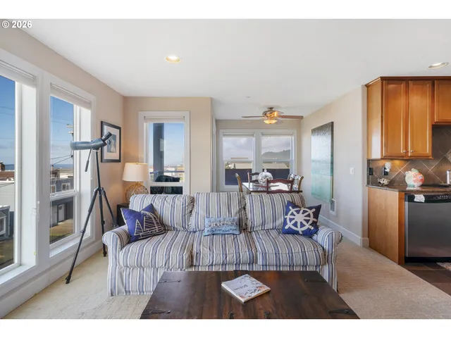 a view of a swimming pool with an outdoor seating