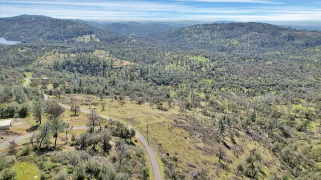 a view of beach and a yard