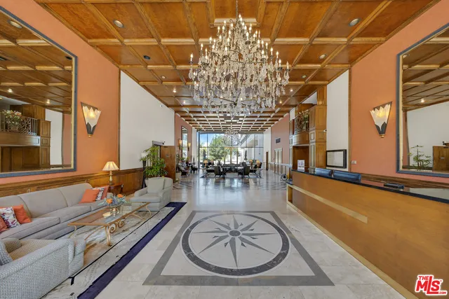 a very nice looking dining room with a table and chairs