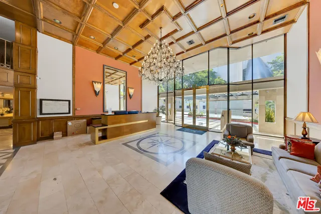 a living room with large windows