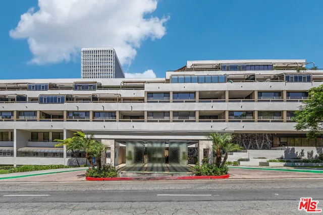 a front view of a building with street view