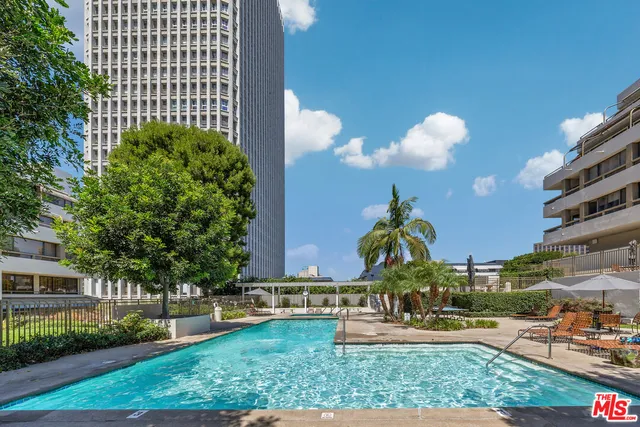 a play ground with trees in the background