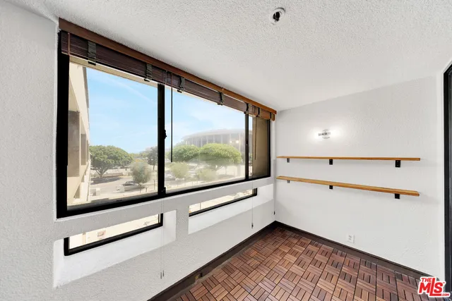 a view of an empty room with window