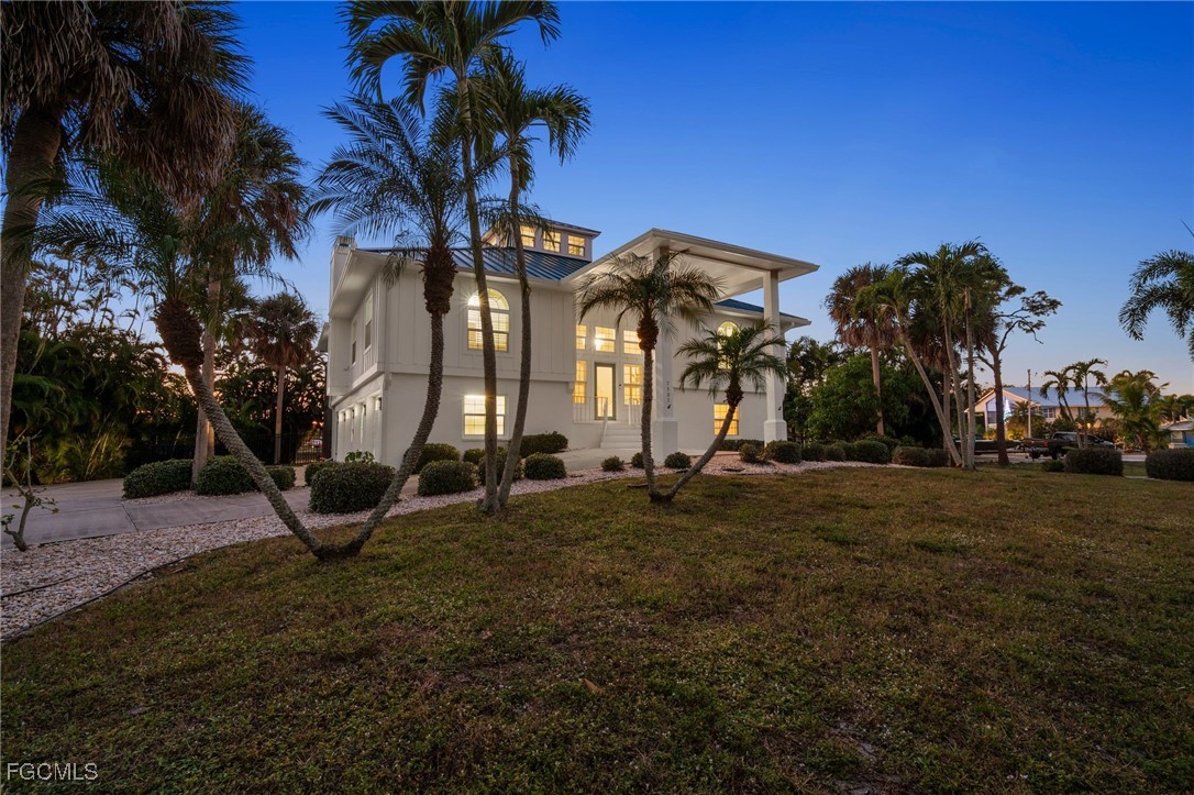 7507 Grande Pine Road Bokeelia, FL 33922 - Photo 46 of 46 a view of a house with basketball court
