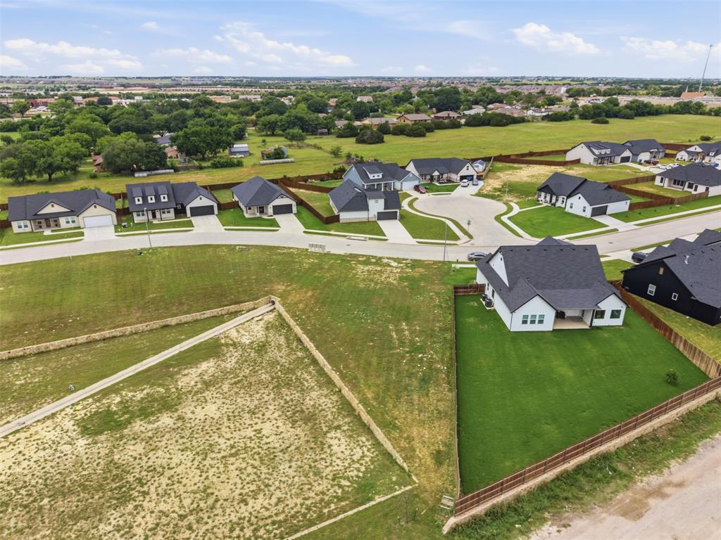 516 Highview Court Godley, TX 76044 - Photo 8 of 15 a view of a city with an ocean view