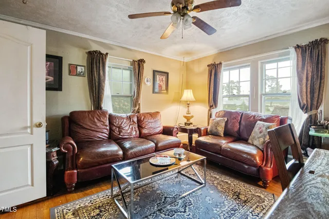 a bedroom with furniture and a closet