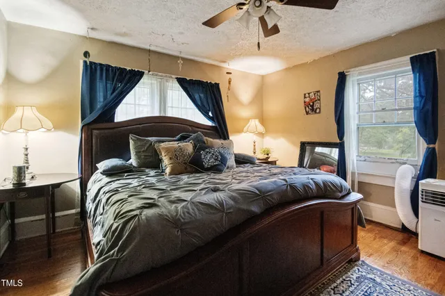 a front view of a house with garden and entryway