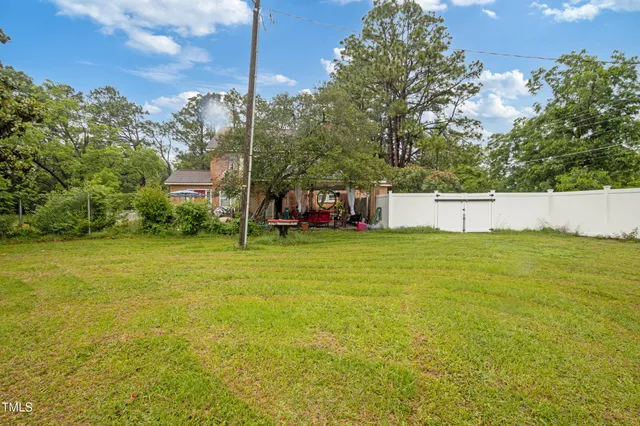 a view of a swimming pool and an outdoor space