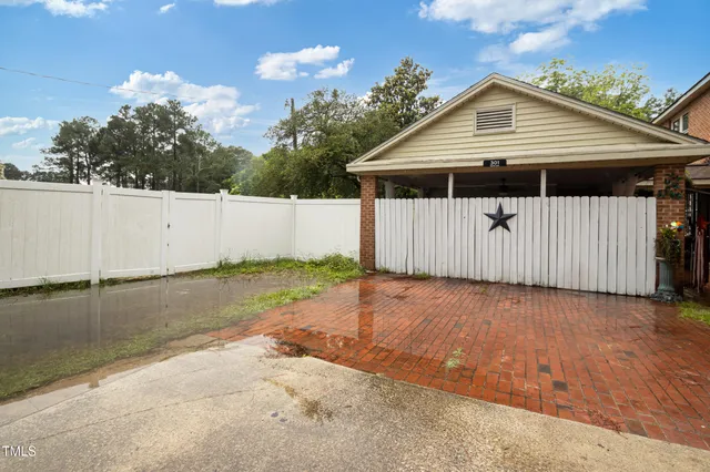 a view of a backyard with a garden