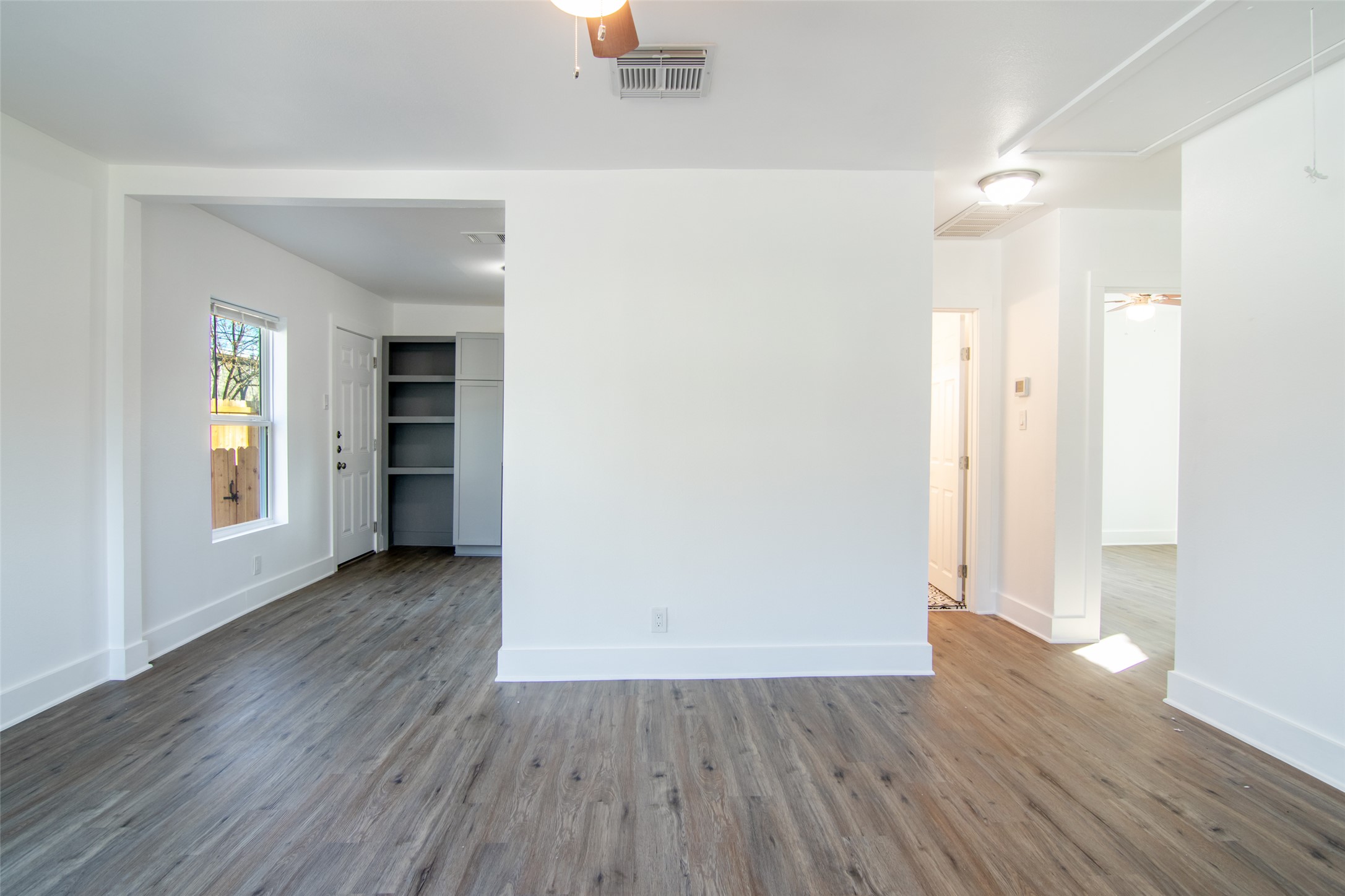 3203 East 16th Street Austin, TX 78721 - Photo 3 of 21 Open living space with easy flow to the kitchen, bathroom and bedrooms.