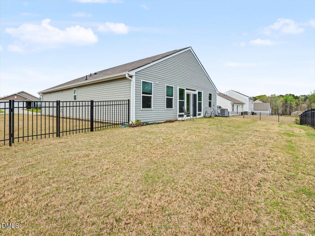 90 Barnsley Road Angier, NC 27501 - Photo 36 of 40 a view of a house with a yard and mountain view