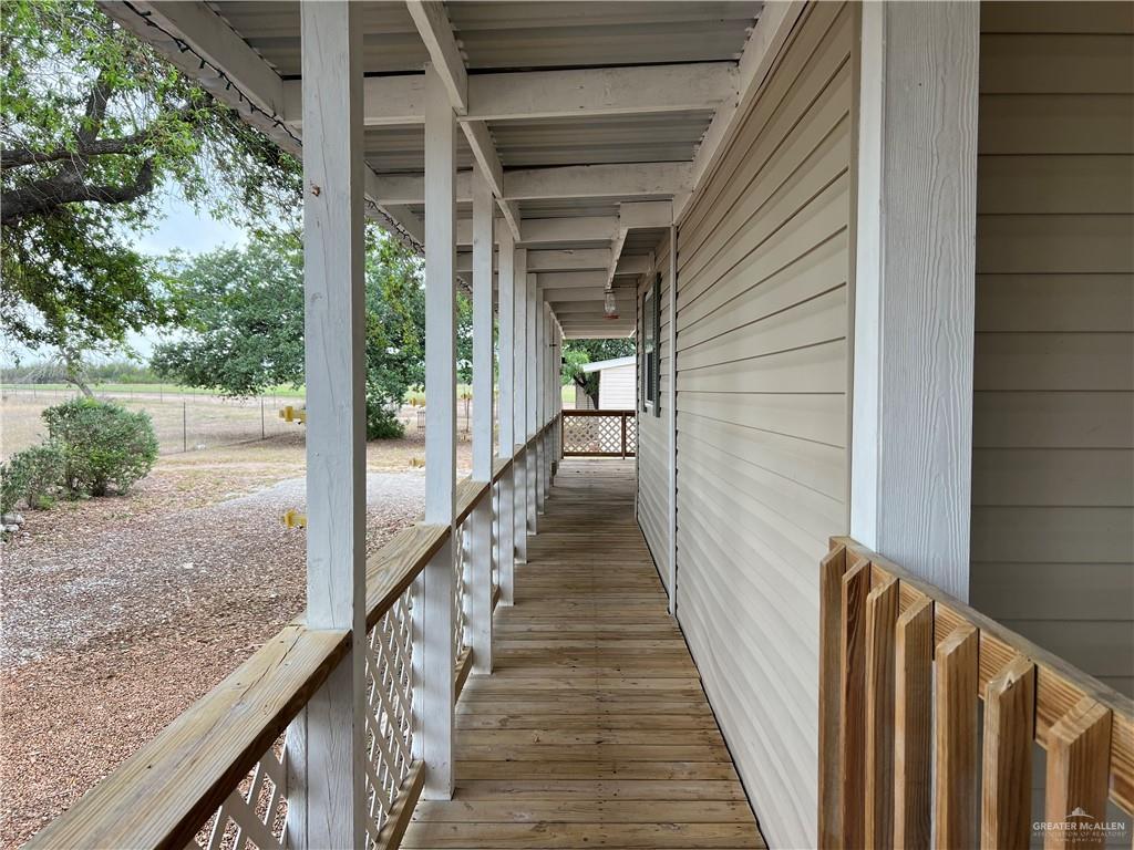 14735 North Trosper Road Mission, TX 78573 - Photo 17 of 34 Walkway in between front and back decks