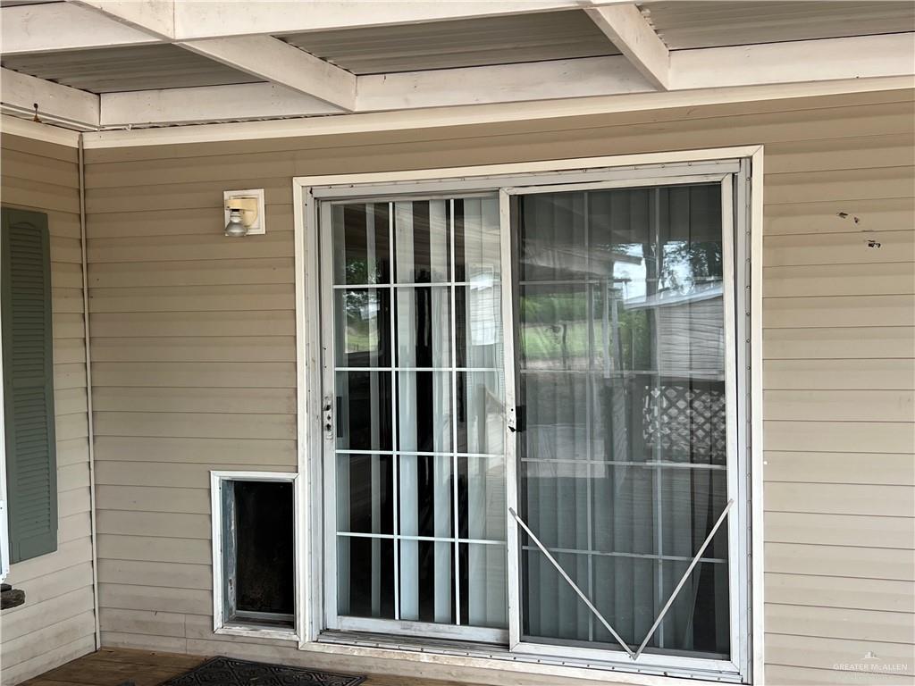 14735 North Trosper Road Mission, TX 78573 - Photo 10 of 34 rear entry with Doggy Door