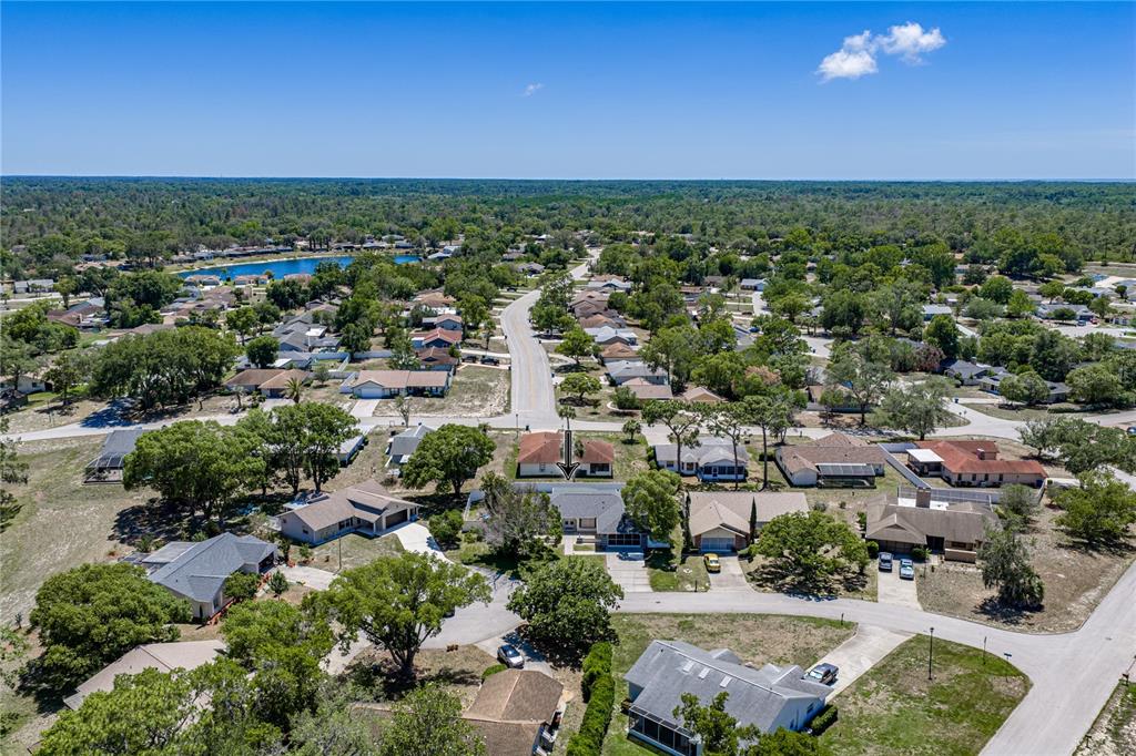 7435 Kilbride Court Weeki Wachee, FL 34613 - Photo 48 of 67 an aerial view of multiple house