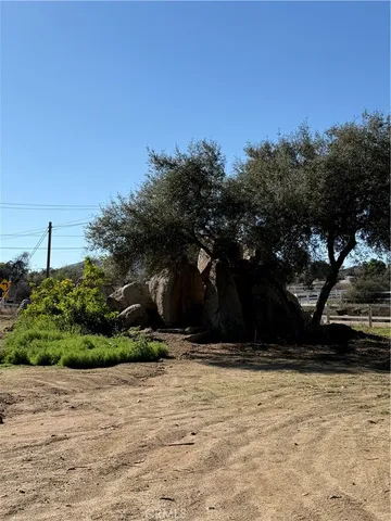 a view of house with yard