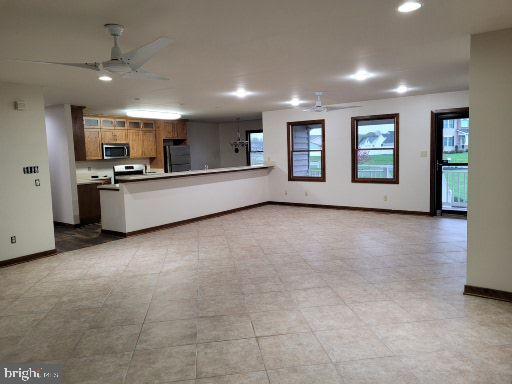 36824 Red Berry Road Delmar, DE 19940 - Photo 14 of 42 Living /dining room/ceiling fan & recessed lights