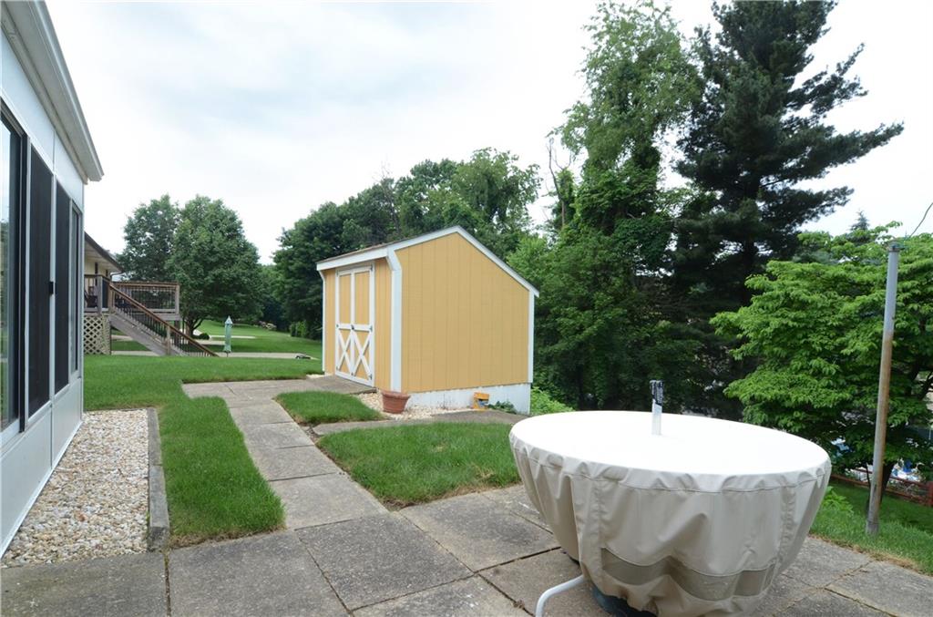 207 Lytton Road Coraopolis, PA 15108 - Photo 15 of 17 a view of a small house with backyard