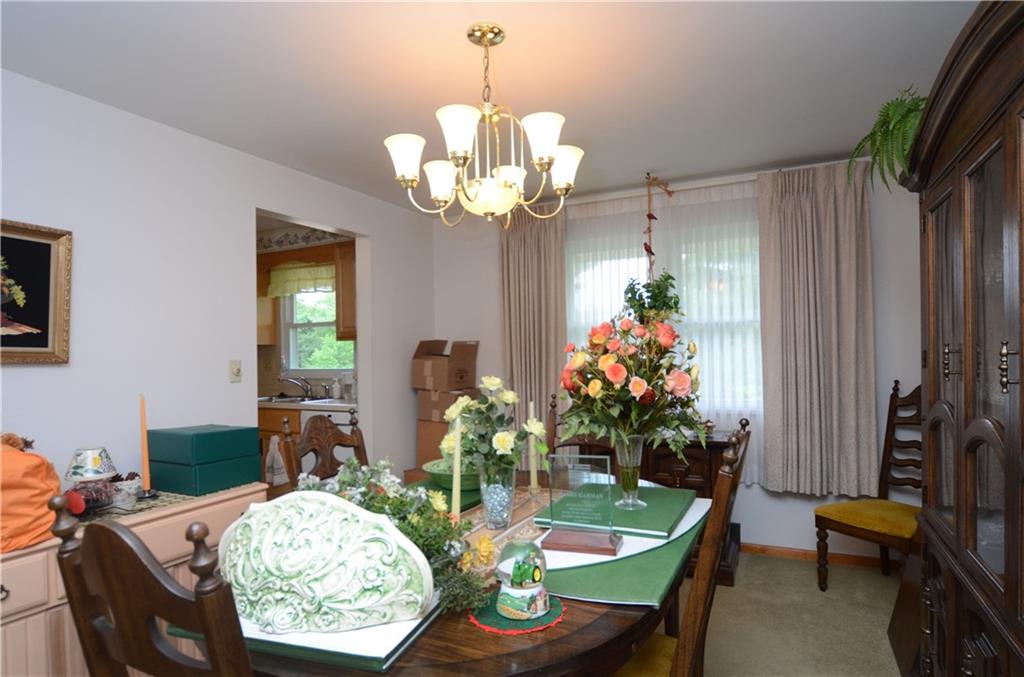 207 Lytton Road Coraopolis, PA 15108 - Photo 5 of 17 a dining room with furniture a chandelier and wooden floor