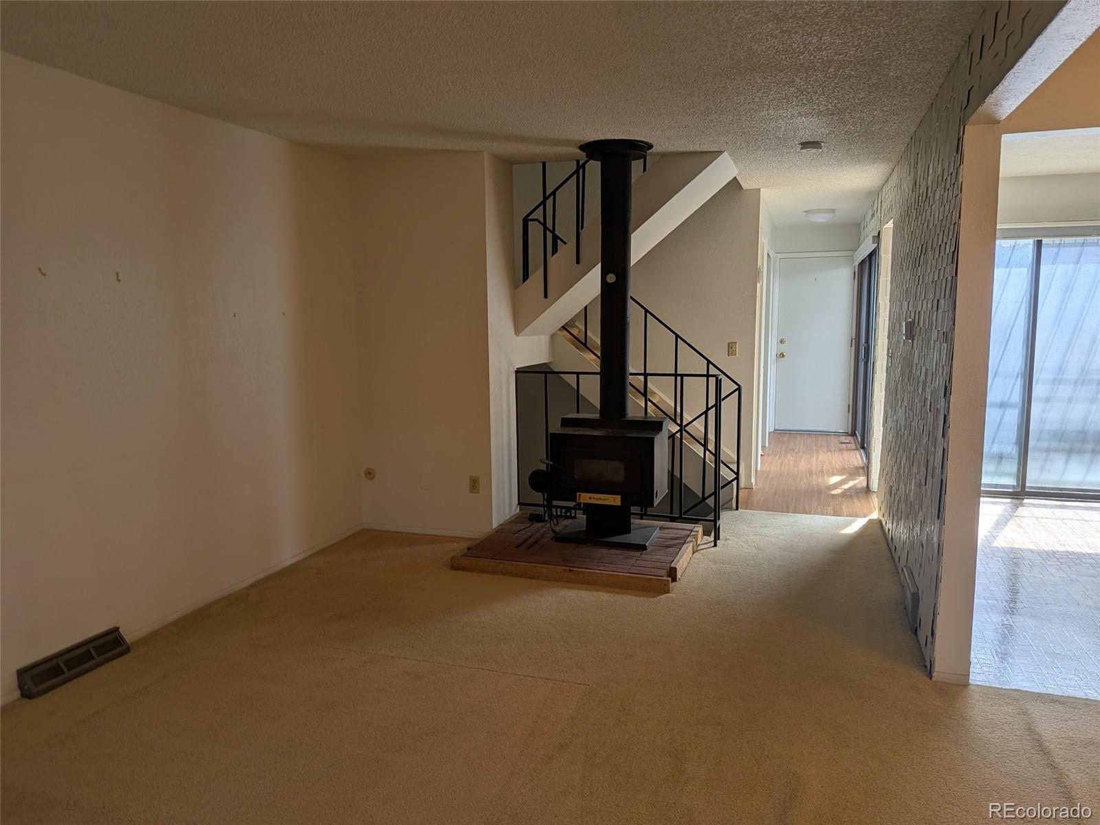 6440 Wright Street Arvada, CO 80004 - Photo 3 of 15 a view of entryway
