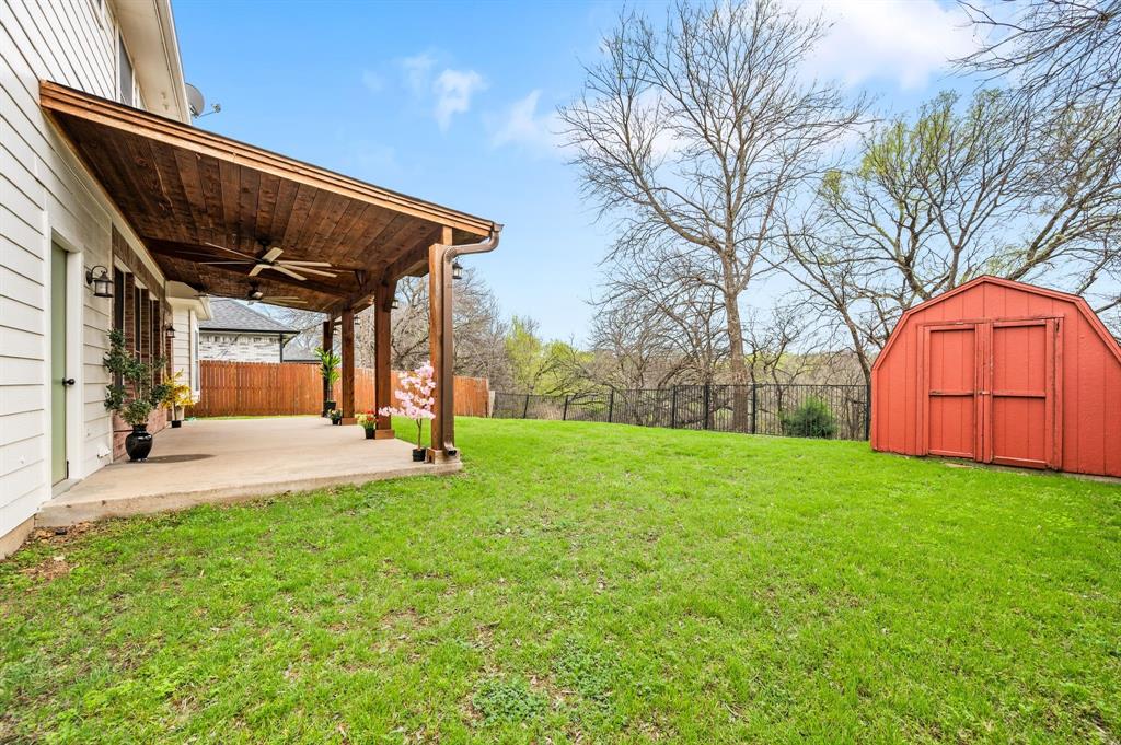 4008 Falcon Ridge Drive Haltom City, TX 76137 - Photo 2 of 32 a view of backyard with green space