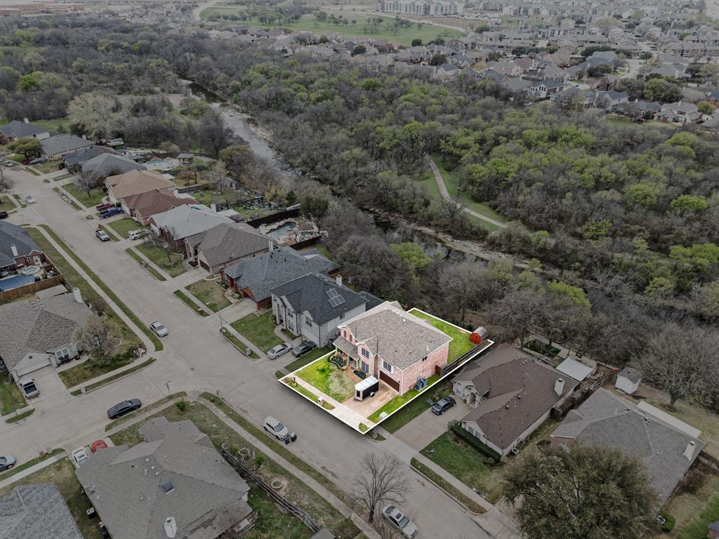 4008 Falcon Ridge Drive Haltom City, TX 76137 - Photo 3 of 32 an aerial view of a house with outdoor space