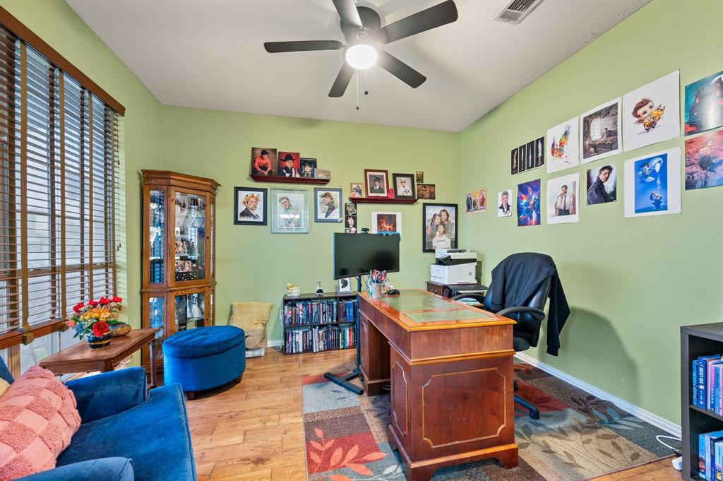 4008 Falcon Ridge Drive Haltom City, TX 76137 - Photo 8 of 32 a work room with furniture and a window