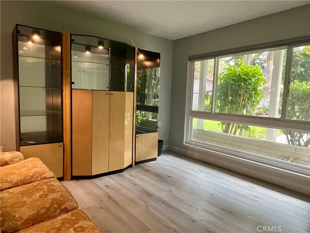 a view of front door and wooden floor