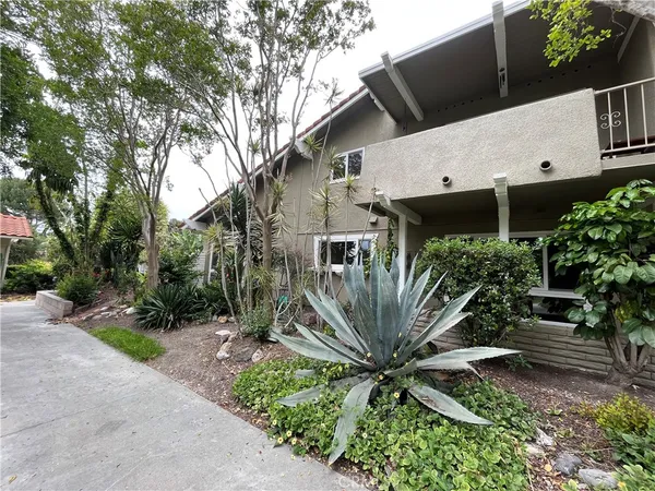 a view of a back yard of the house