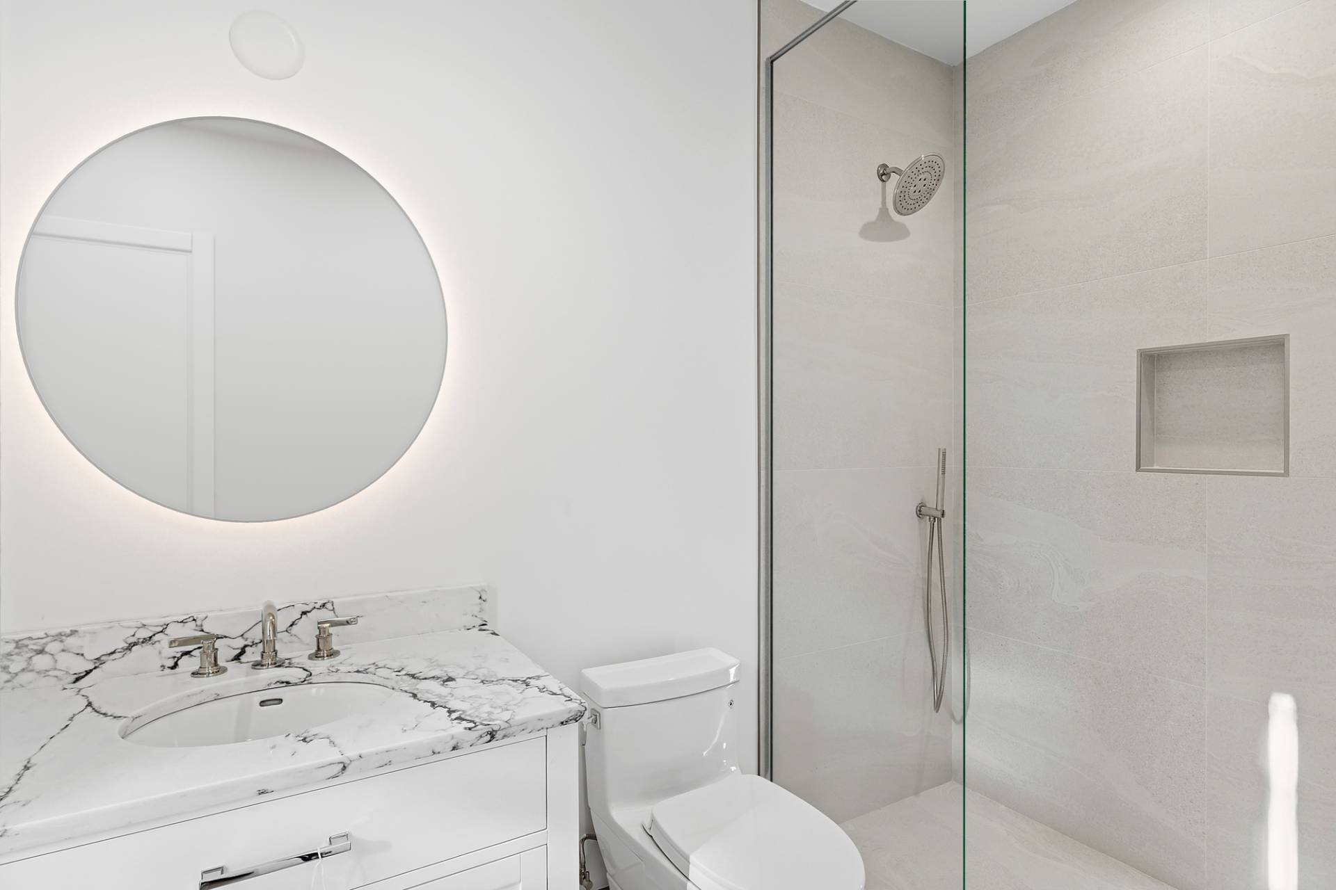 126 Long Lane East Hampton, NY 11937 - Photo 15 of 26 a bathroom with a sink toilet and shower