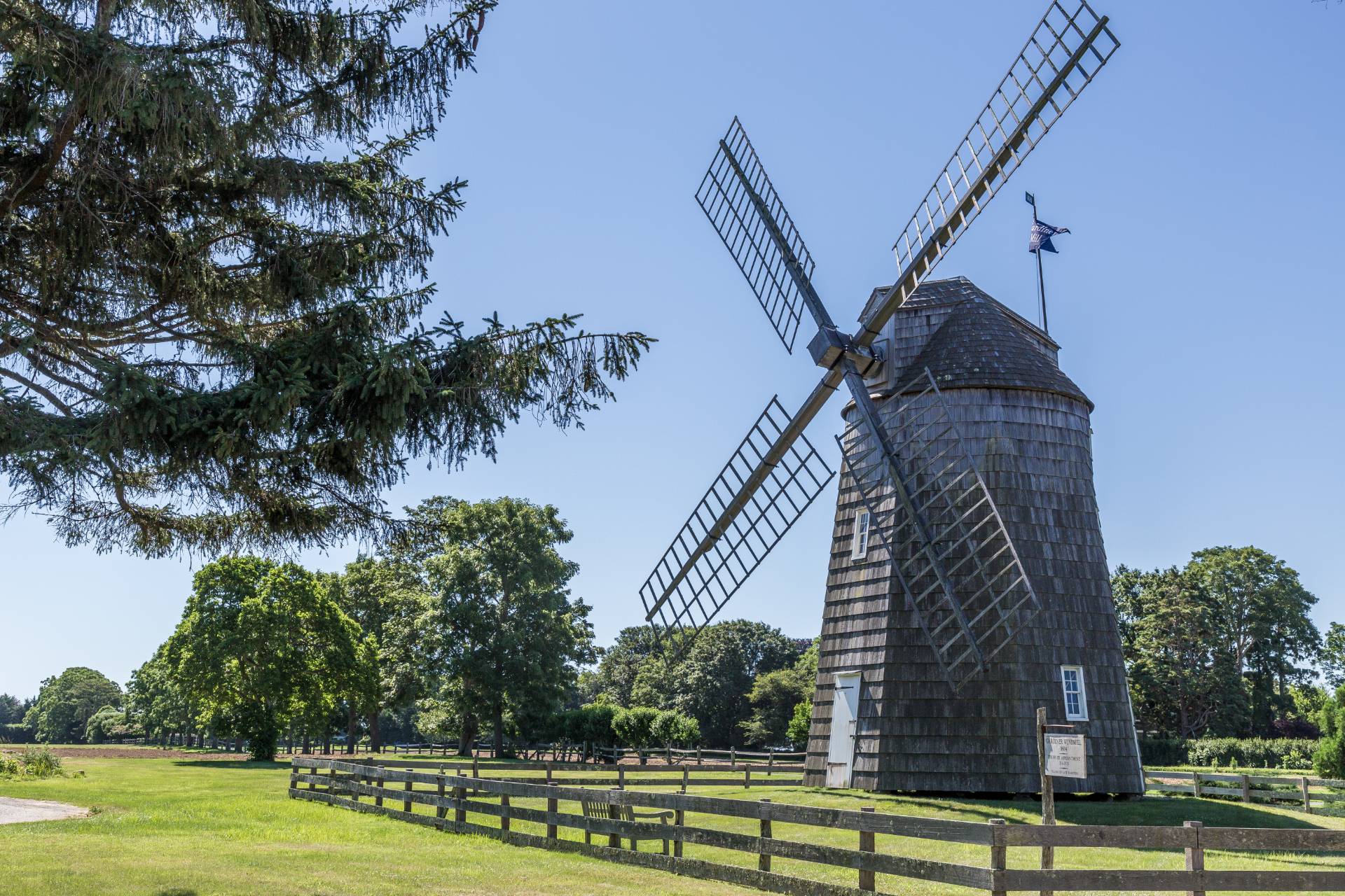 126 Long Lane East Hampton, NY 11937 - Photo 24 of 26 a view of a swimming pool with a big yard and large trees