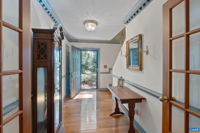 a view of a deck with wooden floor and fence