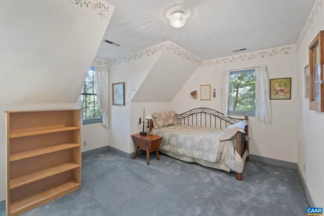 a view of a yard with a tree