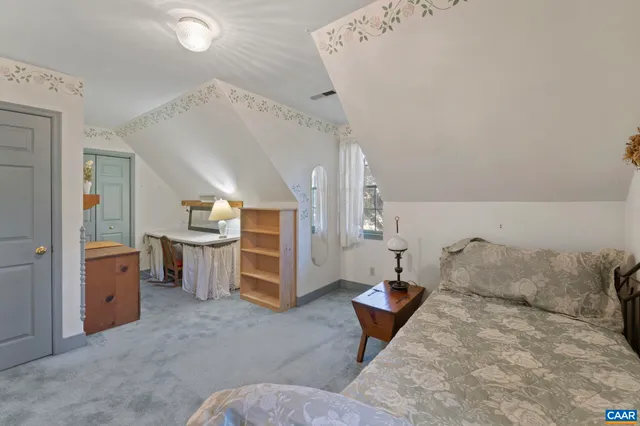 a front view of a house with trees