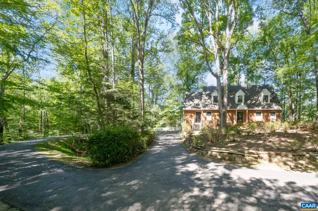front view of a house with a small yard
