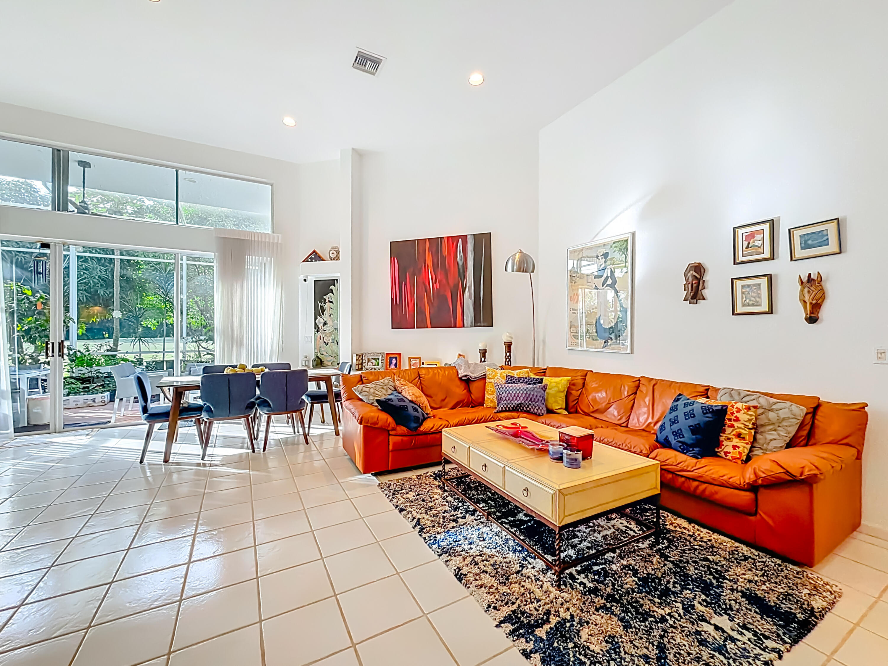 11853 Fountainside Circle Boynton Beach, FL 33437 - Photo 19 of 64 a living room with furniture a rug and a large window