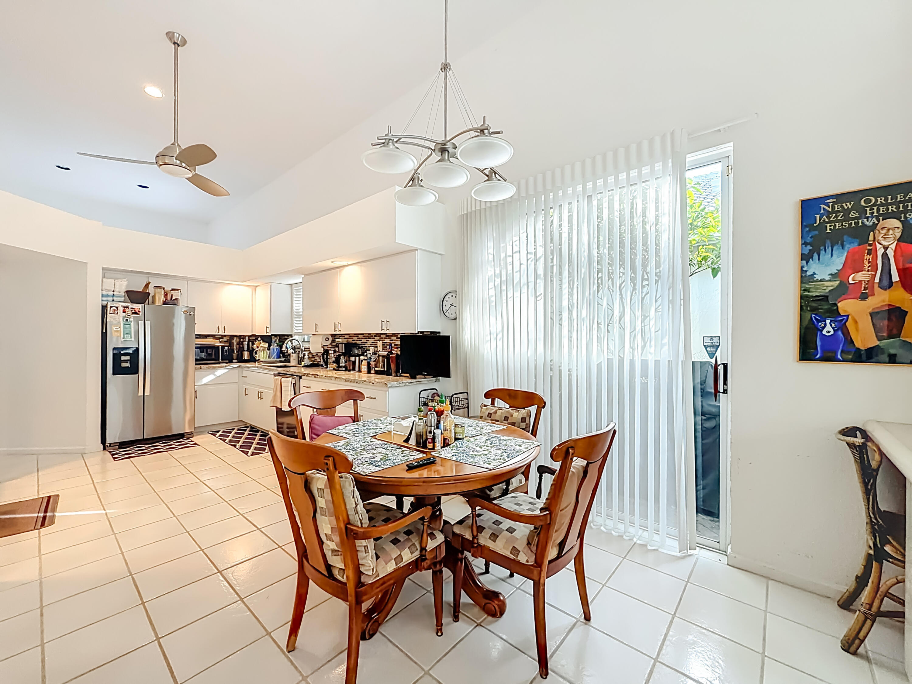 11853 Fountainside Circle Boynton Beach, FL 33437 - Photo 27 of 64 a dining room with furniture and window