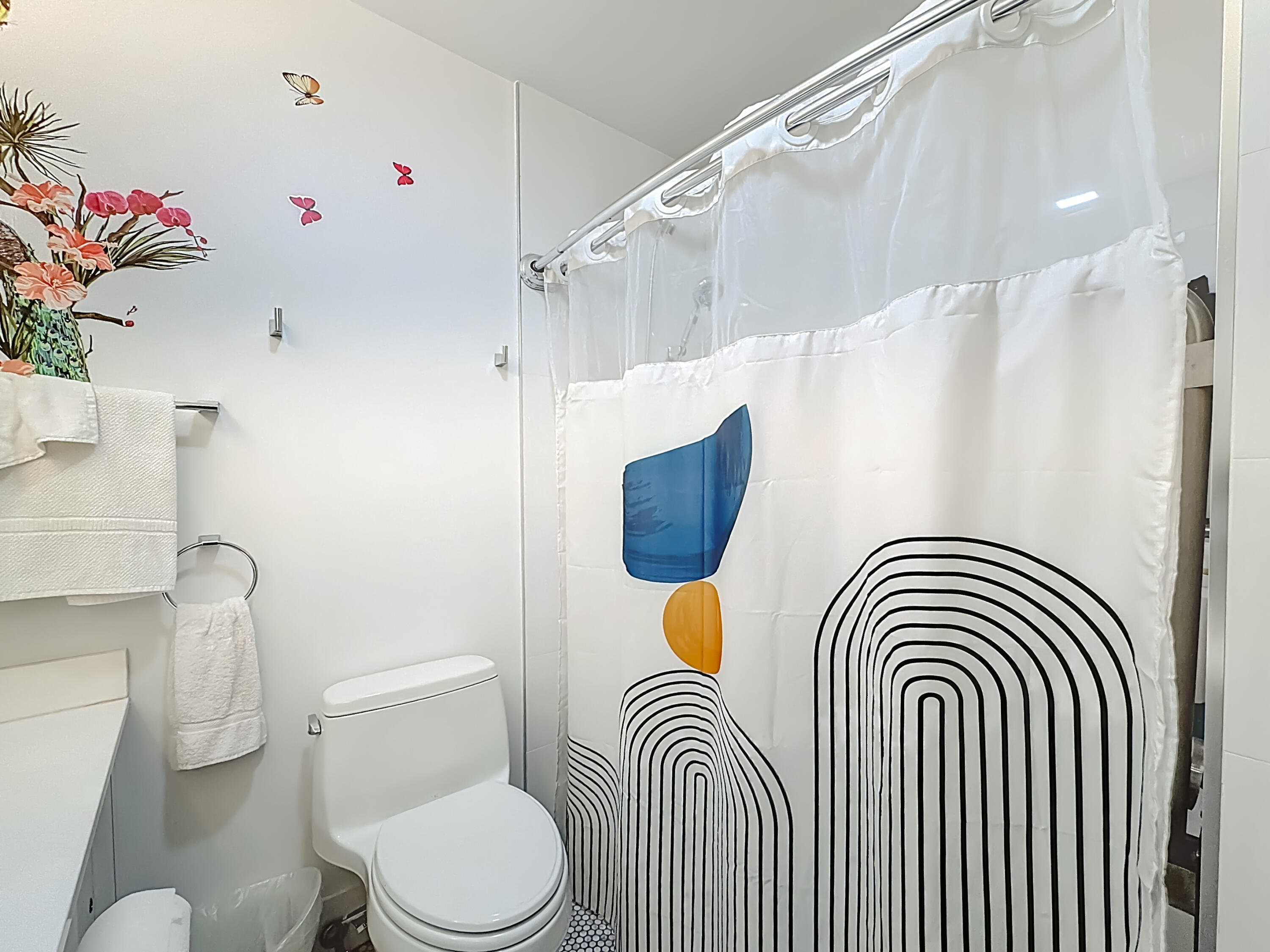 11853 Fountainside Circle Boynton Beach, FL 33437 - Photo 51 of 64 a bathroom with a sink a toilet and shower curtain