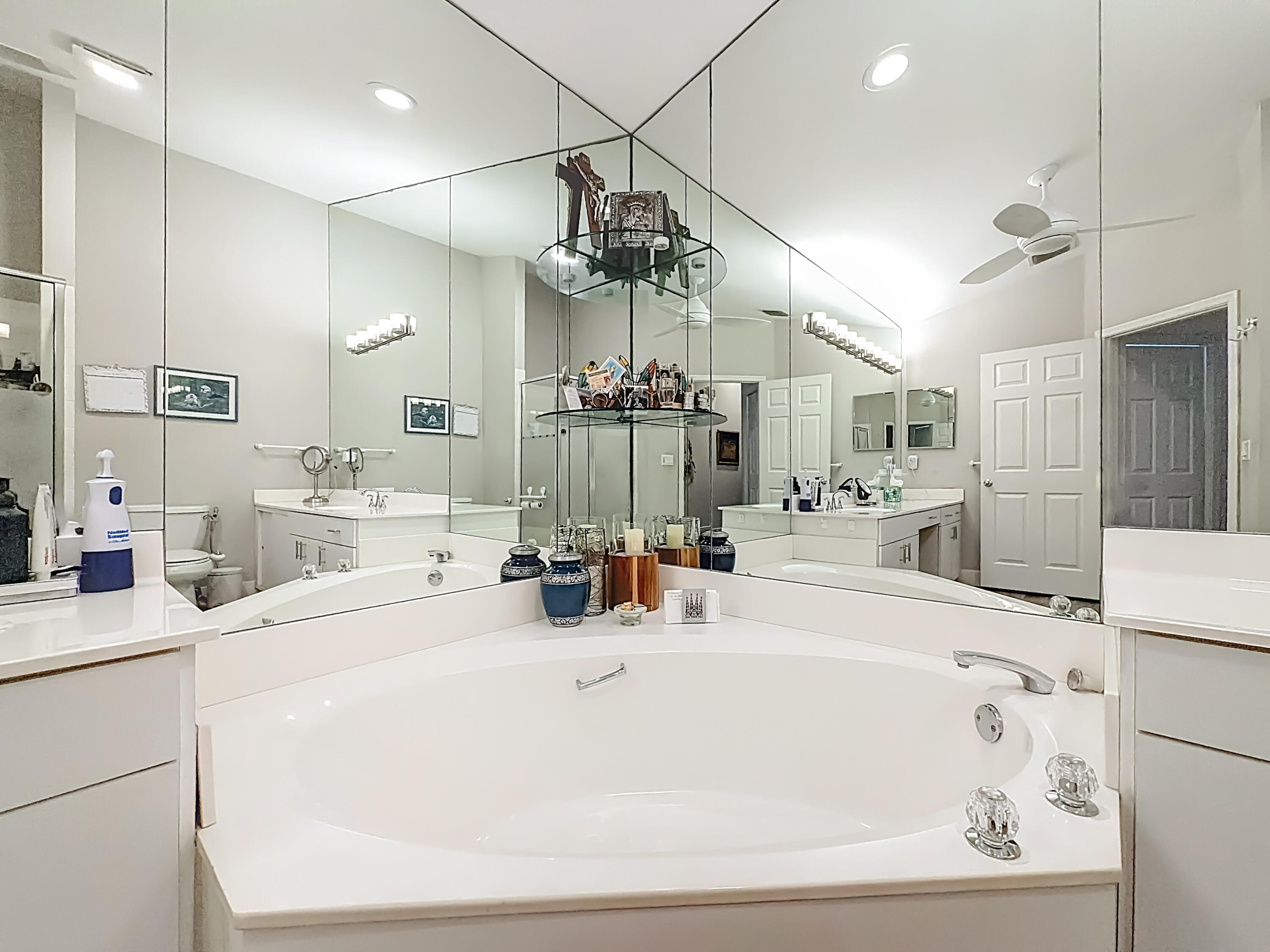 11853 Fountainside Circle Boynton Beach, FL 33437 - Photo 62 of 64 a bathroom with a sink a large mirror and a shower