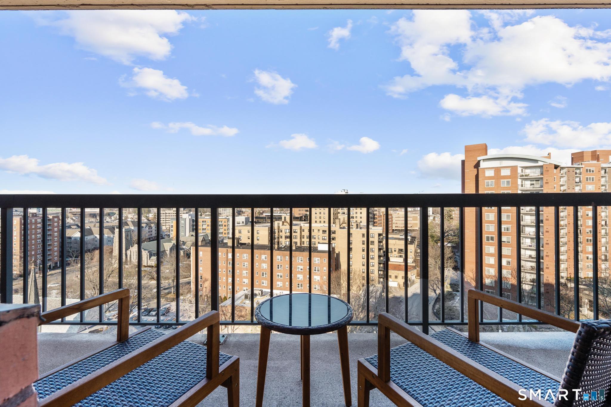 25 Forest Street, Unit 15E Stamford, CT 06901 - Photo 21 of 40 a view of a balcony with furniture