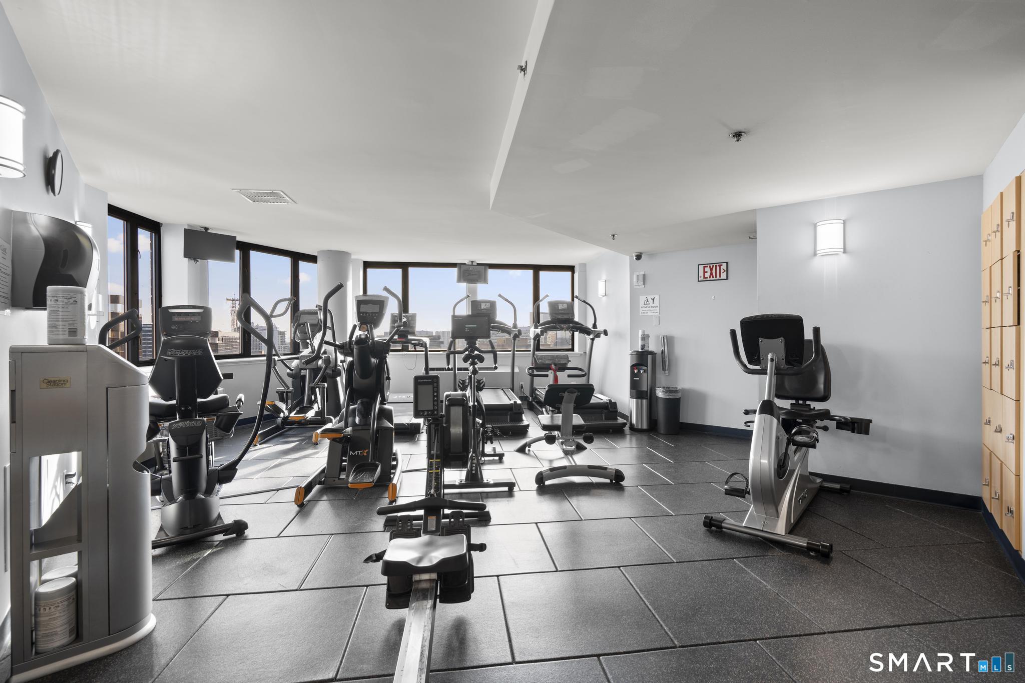 25 Forest Street, Unit 15E Stamford, CT 06901 - Photo 29 of 40 a view of a room with gym equipment