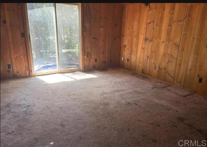 22021 Crestline Road Palomar Mountain, CA 92060 - Photo 14 of 15 a view of a room with a wooden door