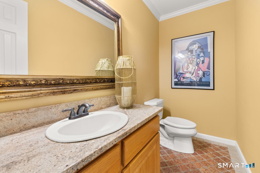 3 Owl Ridge Lane Sandy Hook, CT 06482 - Photo 19 of 40 a bathroom with a granite countertop sink and a mirror