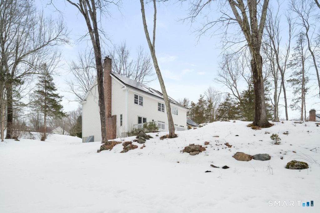 3 Owl Ridge Lane Sandy Hook, CT 06482 - Photo 2 of 40 a view of snow on the side of the road