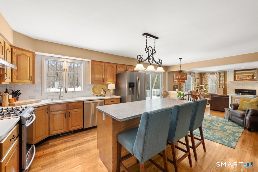 3 Owl Ridge Lane Sandy Hook, CT 06482 - Photo 27 of 40 a view of a dining room with furniture window and wooden floor